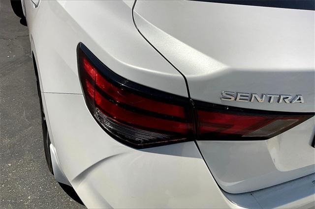 Photo of 2023 Aspen White Tricoat Nissan Sentra