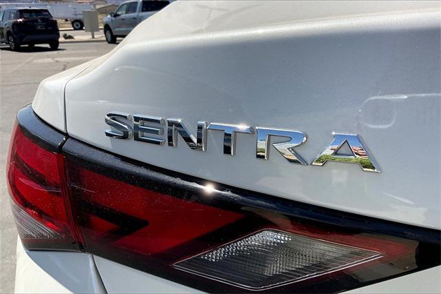 Photo of 2023 Aspen White Tricoat Nissan Sentra