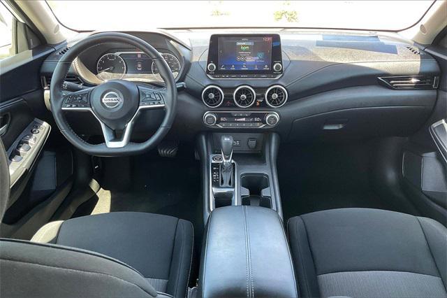 Photo of 2023 Aspen White Tricoat Nissan Sentra