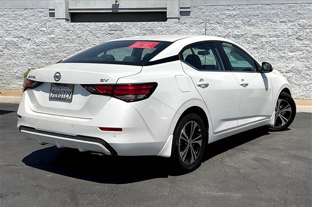Photo of 2023 Aspen White Tricoat Nissan Sentra