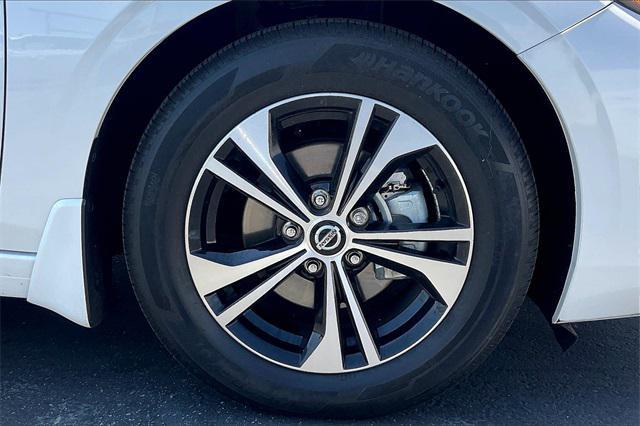 Photo of 2023 Aspen White Tricoat Nissan Sentra