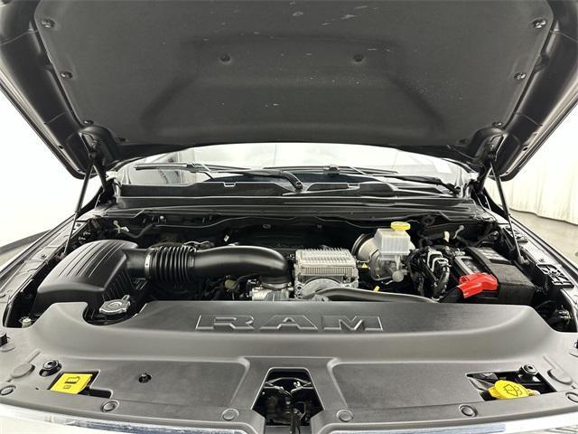 Photo of 2023 Granite Crystal Clearcoat Metallic RAM 1500