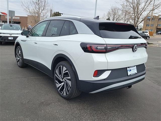 Photo of 2025 Opal White Pearl W / Black Roof Volkswagen ID.4