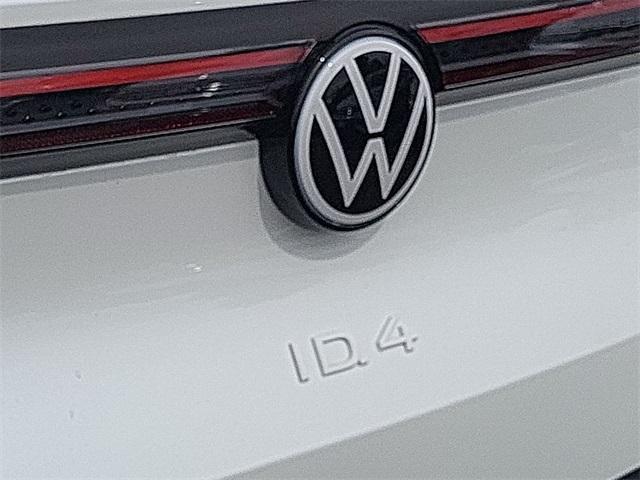 Photo of 2025 Opal White Pearl W / Black Roof Volkswagen ID.4