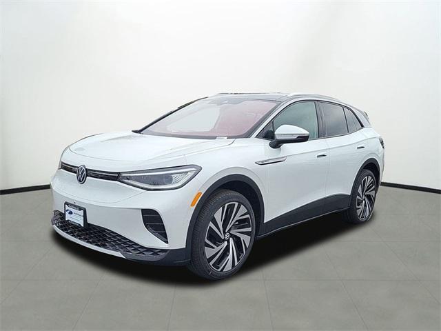 Photo of 2025 Opal White Pearl W / Black Roof Volkswagen ID.4