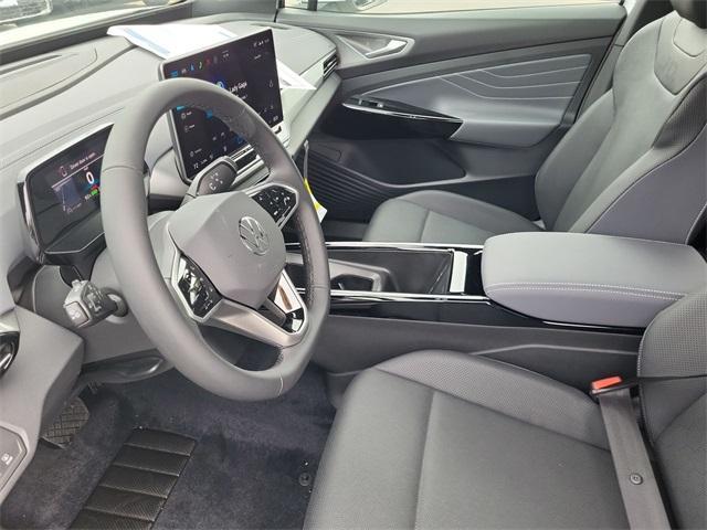Photo of 2025 Opal White Pearl W / Black Roof Volkswagen ID.4