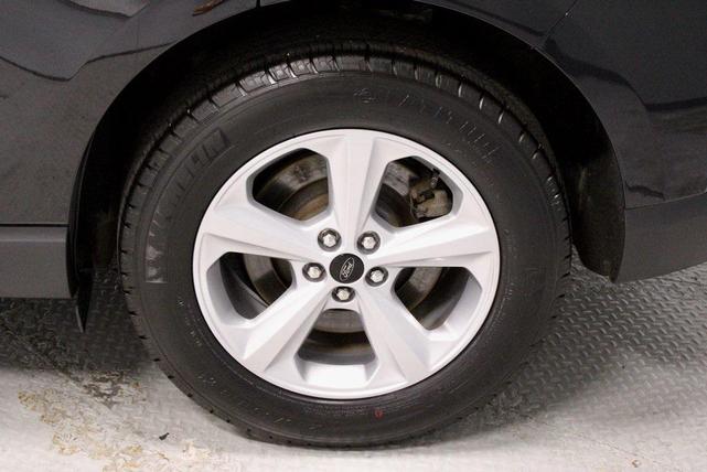 Photo of 2024 Agate Black Metallic Ford Edge