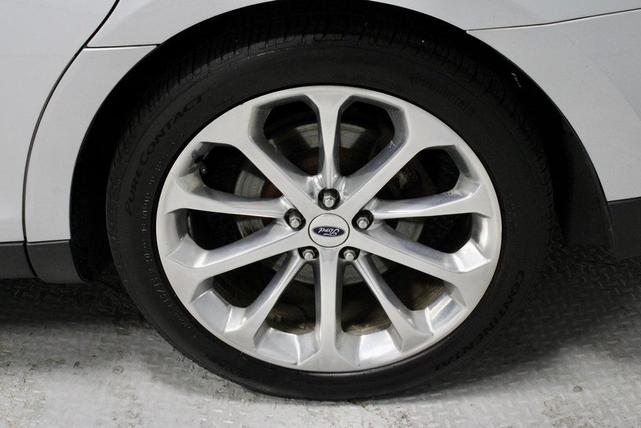 Photo of 2016 Ingot Silver Metallic Ford Taurus