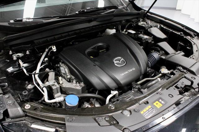 Photo of 2024 Jet Black Mica Mazda CX-50