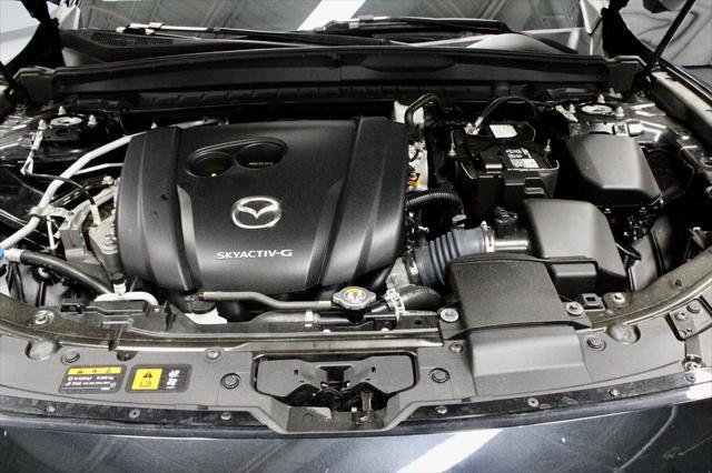 Photo of 2024 Jet Black Mica Mazda CX-50