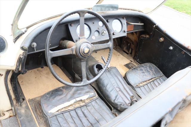 Photo of 1957 Ivory Jaguar XK 140