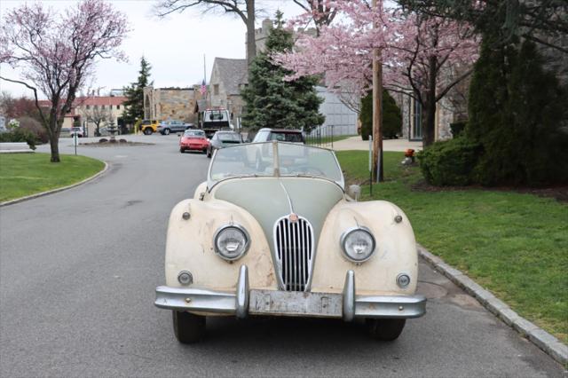 Photo of 1957 Ivory Jaguar XK 140
