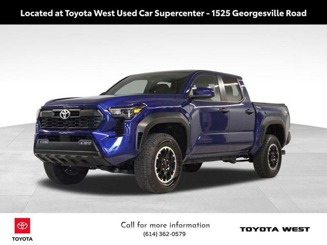 Photo of 2025 Blue Crush Metallic Toyota Tacoma