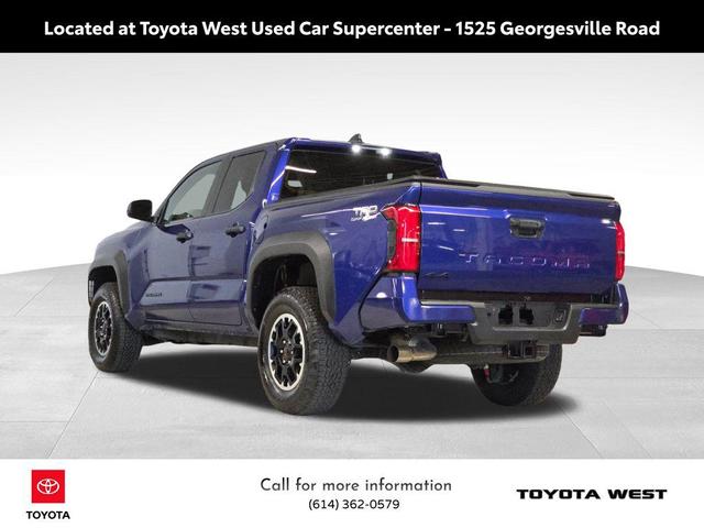 Photo of 2025 Blue Crush Metallic Toyota Tacoma