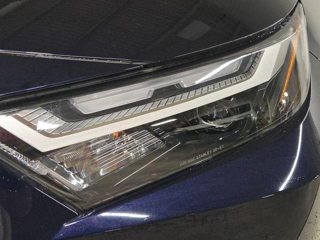 Photo of 2024 Dark Blue Toyota RAV4 Hybrid
