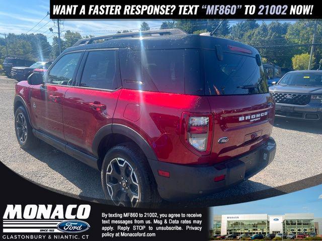Photo of 2025 Ruby Red Metallic Tinted Clearcoat Ford Bronco Sport