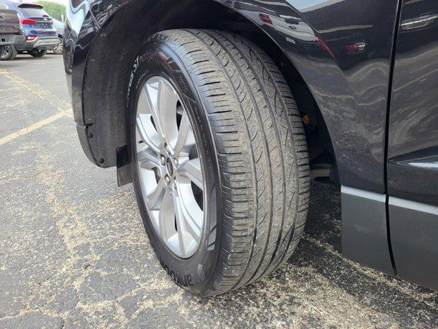 Photo of 2024 Agate Black Metallic Ford Edge