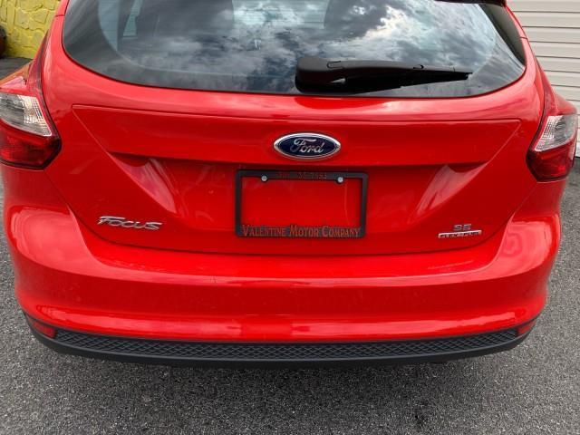Photo of 2014 Ruby Red Tinted Clearcoat Ford Focus