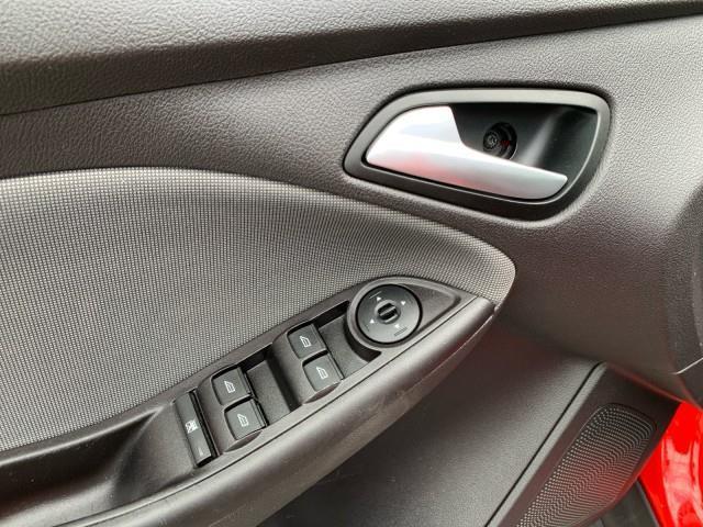 Photo of 2014 Ruby Red Tinted Clearcoat Ford Focus