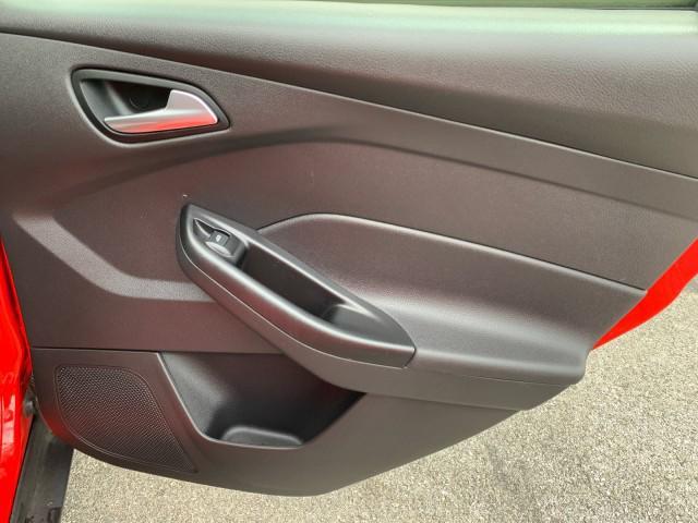 Photo of 2014 Ruby Red Tinted Clearcoat Ford Focus