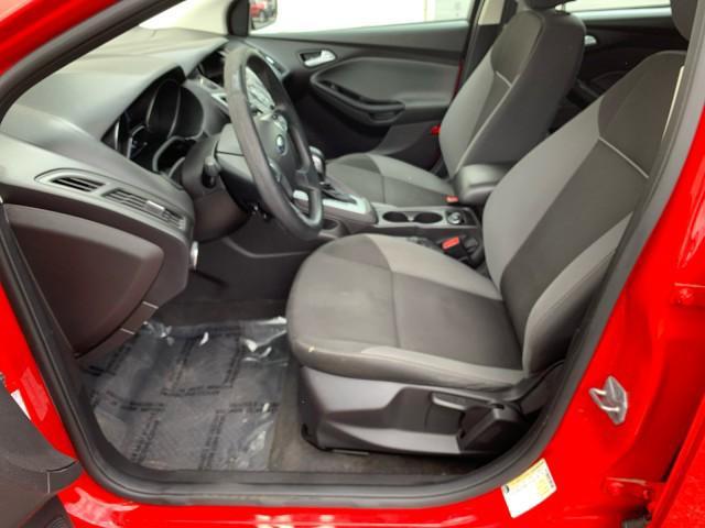 Photo of 2014 Ruby Red Tinted Clearcoat Ford Focus