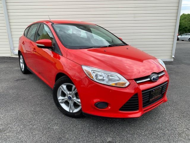 Photo of 2014 Ruby Red Tinted Clearcoat Ford Focus
