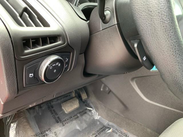 Photo of 2014 Ruby Red Tinted Clearcoat Ford Focus