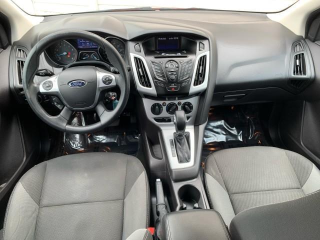Photo of 2014 Ruby Red Tinted Clearcoat Ford Focus