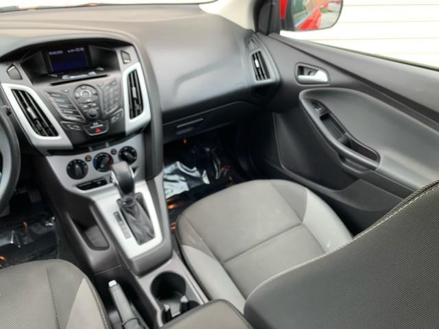 Photo of 2014 Ruby Red Tinted Clearcoat Ford Focus