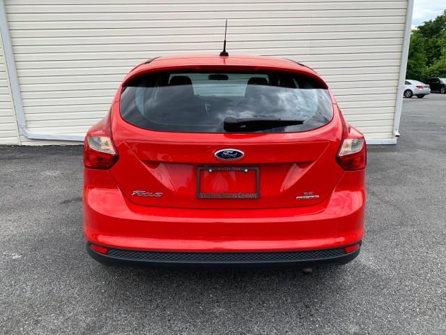 Photo of 2014 Ruby Red Tinted Clearcoat Ford Focus