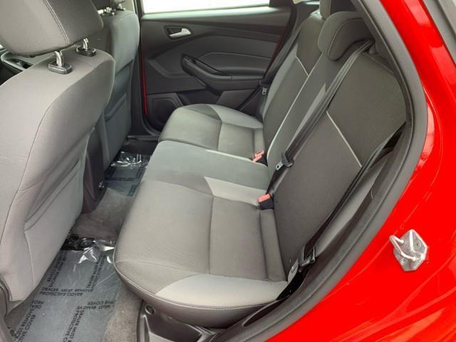 Photo of 2014 Ruby Red Tinted Clearcoat Ford Focus