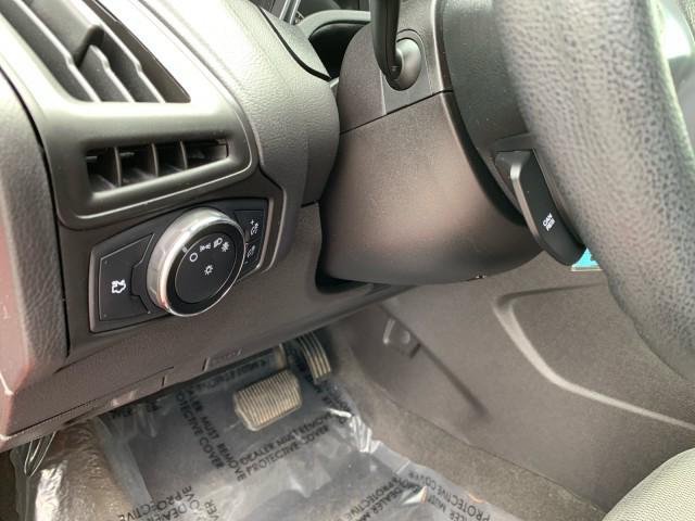 Photo of 2014 Ruby Red Tinted Clearcoat Ford Focus