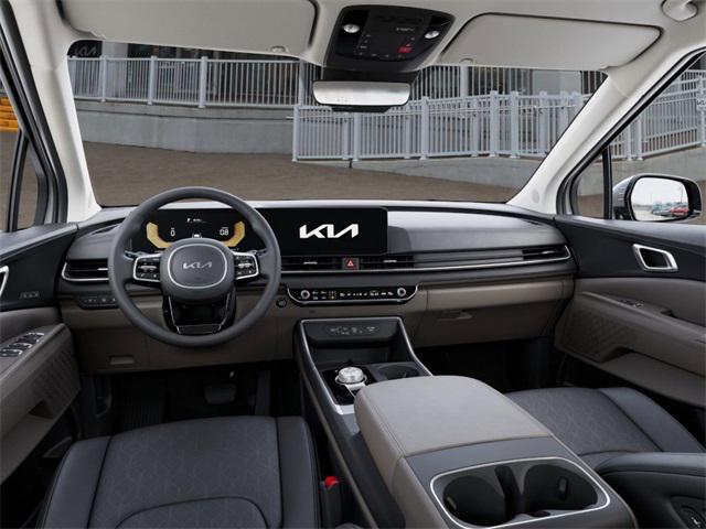 Photo of 2026 White Kia Carnival Hybrid
