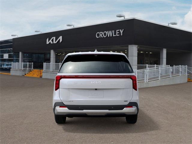 Photo of 2026 White Kia Carnival Hybrid
