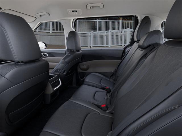 Photo of 2026 White Kia Carnival Hybrid