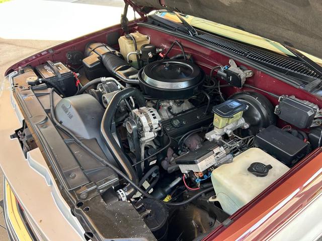 Photo of 1995 Burgandy and Silver GMC Sierra 1500