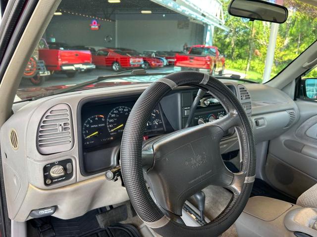 Photo of 1995 Burgandy and Silver GMC Sierra 1500