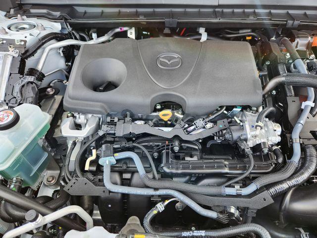 Photo of 2025 Wind Chill Pearl Mazda CX-50 Hybrid