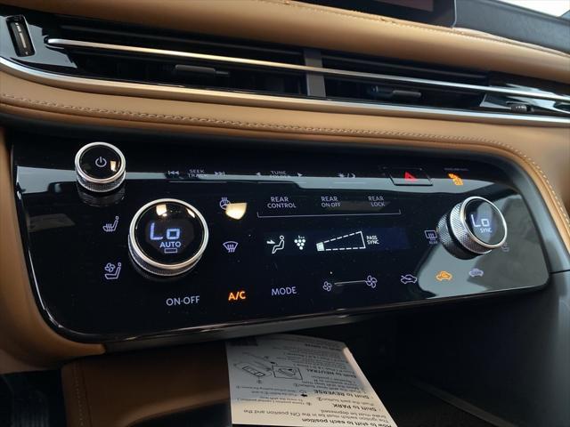 Photo of 2025 Grand Blue/Black Obsidian INFINITI QX60