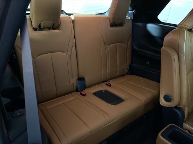 Photo of 2025 Grand Blue/Black Obsidian INFINITI QX60
