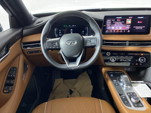 Photo of 2025 Grand Blue/Black Obsidian INFINITI QX60