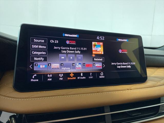 Photo of 2025 Grand Blue/Black Obsidian INFINITI QX60