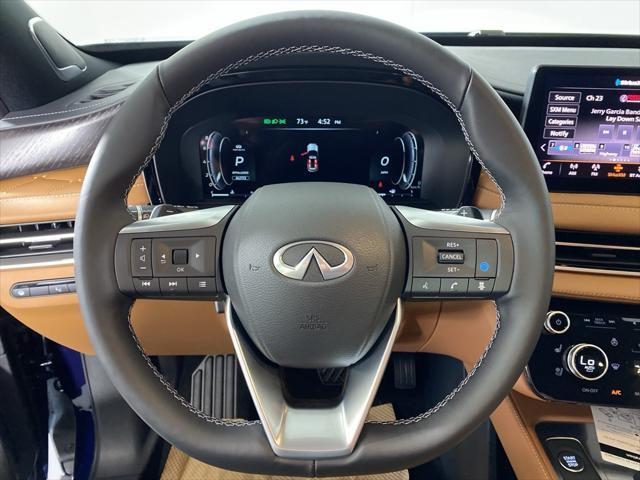 Photo of 2025 Grand Blue/Black Obsidian INFINITI QX60