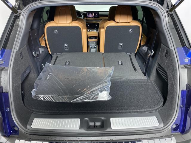 Photo of 2025 Grand Blue/Black Obsidian INFINITI QX60
