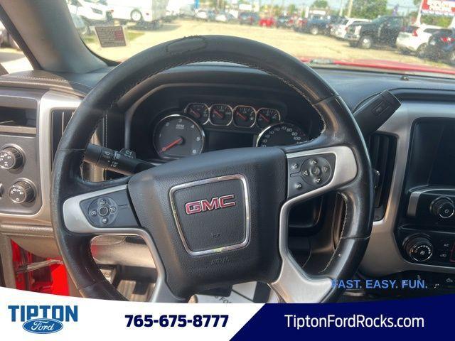 Photo of 2015 Fire Red GMC Sierra 1500