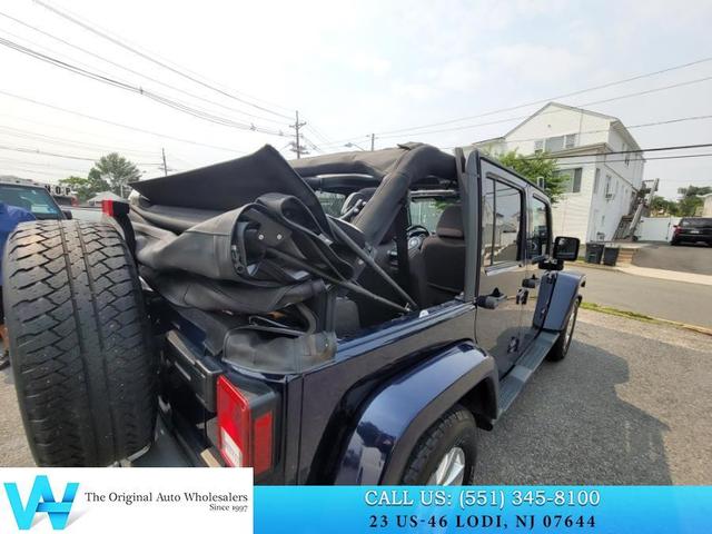 Photo of 2013 True Blue Pearlcoat Jeep Wrangler Unlimited