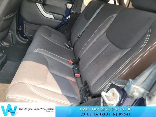 Photo of 2013 True Blue Pearlcoat Jeep Wrangler Unlimited