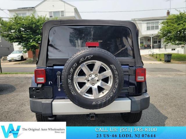 Photo of 2013 True Blue Pearlcoat Jeep Wrangler Unlimited