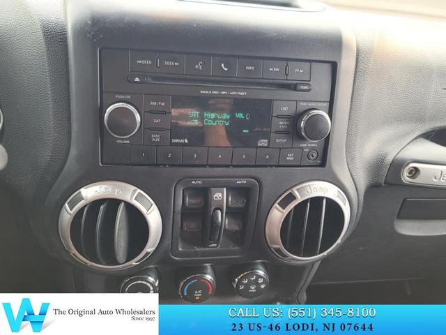 Photo of 2013 True Blue Pearlcoat Jeep Wrangler Unlimited