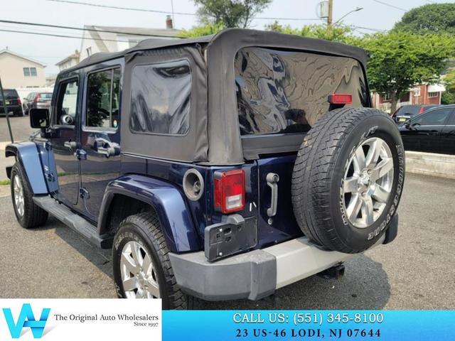 Photo of 2013 True Blue Pearlcoat Jeep Wrangler Unlimited